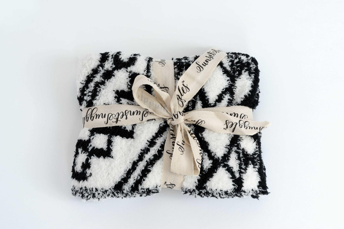 Couverture pour bébé douillette à motif de carreaux à losanges noirs et blancs