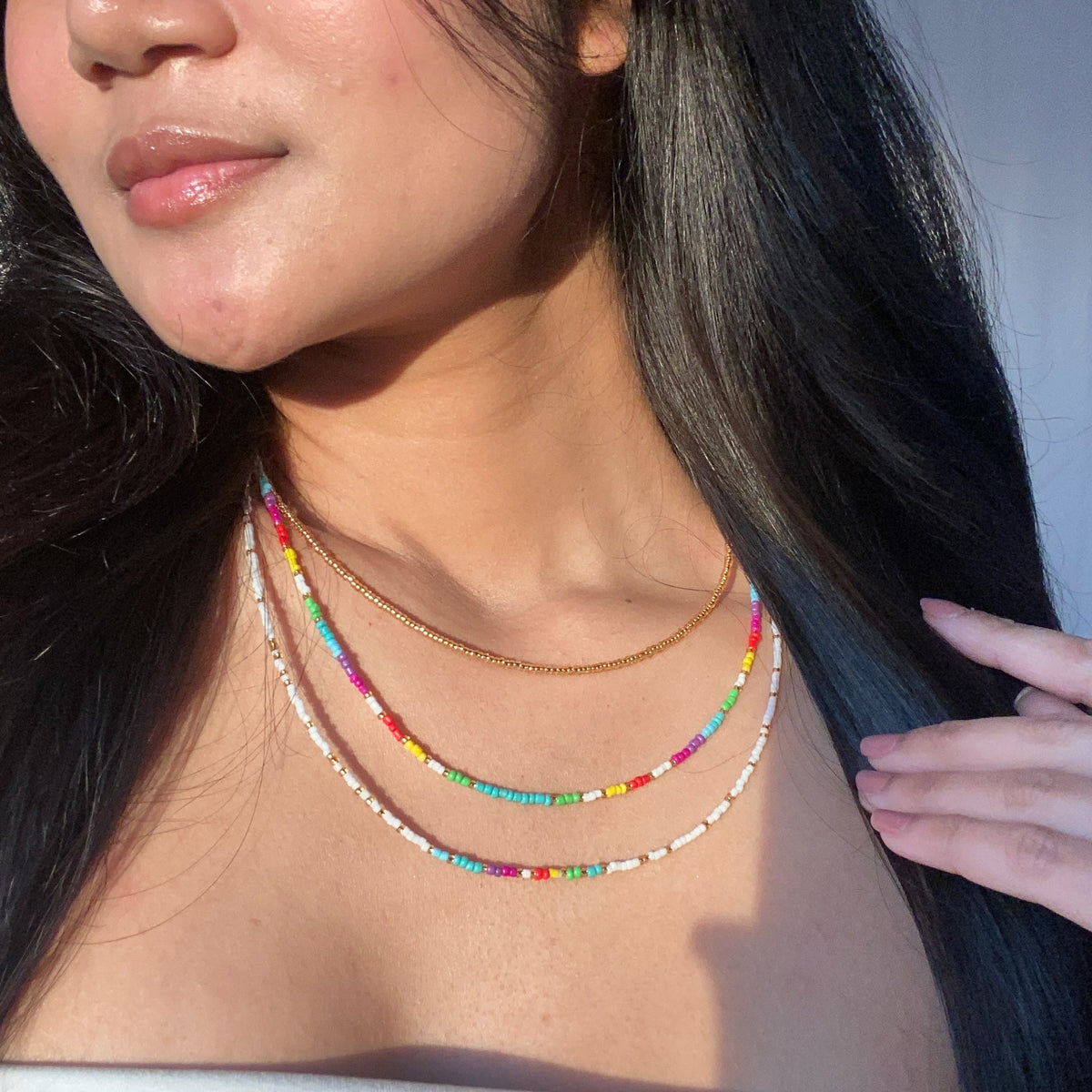 Collier à triple rangs multicolore