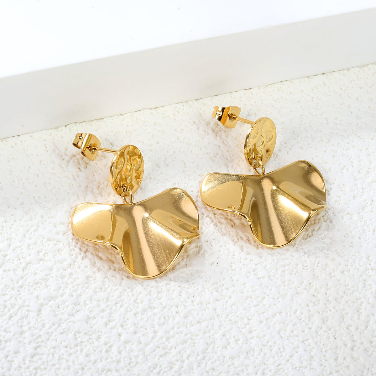 Boucles d'oreilles rondes festonnées texturées