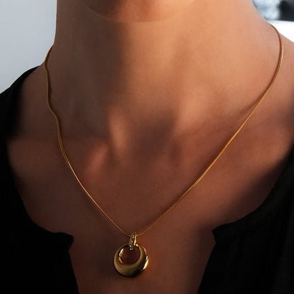 ALBASIMI: Snake Skin Chain with Zirconia (CZ) Embedded Clasp & Asymmetrical Circle Pendent.