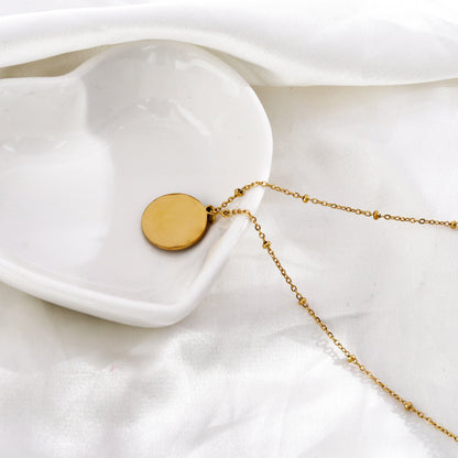 AMASA : Chaîne perlée avec pendentif étoile et lune pavée de zircone - Or