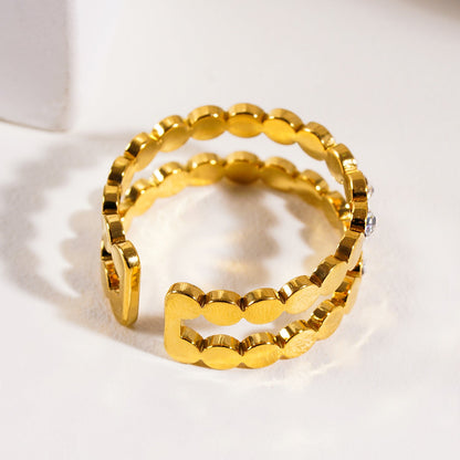 ERLAT : Bague texturée ornée de zircons à double rangée