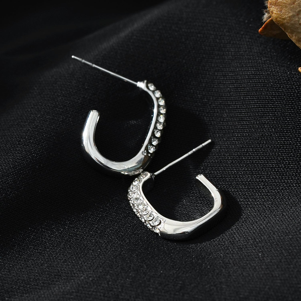 FIRLE Silver (White Gold): Partial Pavé Zirconia Oval Hoop Earrings