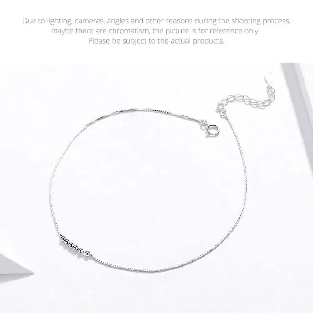 La délicate chaîne de cheville en argent sterling 925 avec perles