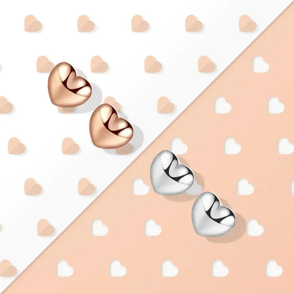 Boucles d'oreilles clous petites cœurs unies en argent sterling 925 | Bijoux fins minimalistes