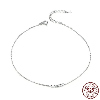 La délicate chaîne de cheville en argent sterling 925 avec perles