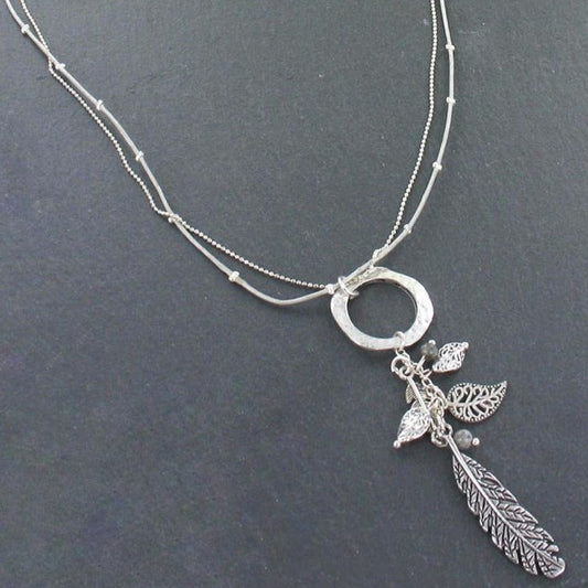 Beaten Ring Necklace With Leaf Charms In Silver Plate