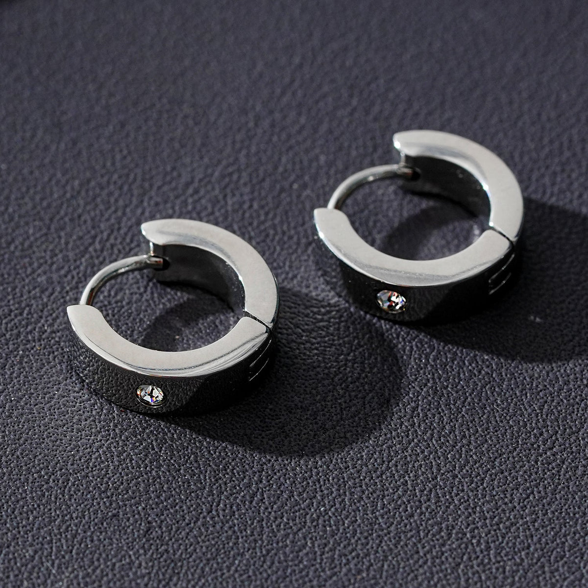 INIS: Wide Mini Hoop Earrings with a Solitaire Zirconia Gemstone in Silver