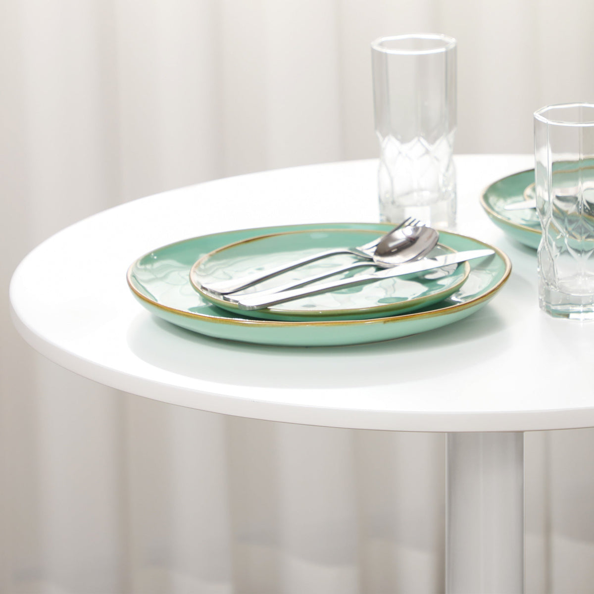 Table à manger ronde moderne Jan avec piètement en acier pour petits espaces-Blanc
