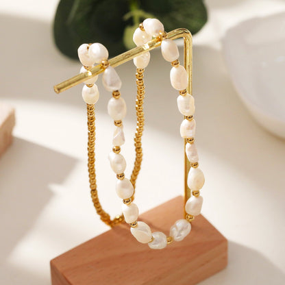 ELISA : Collier chaîne perles d'eau douce et billes dorées