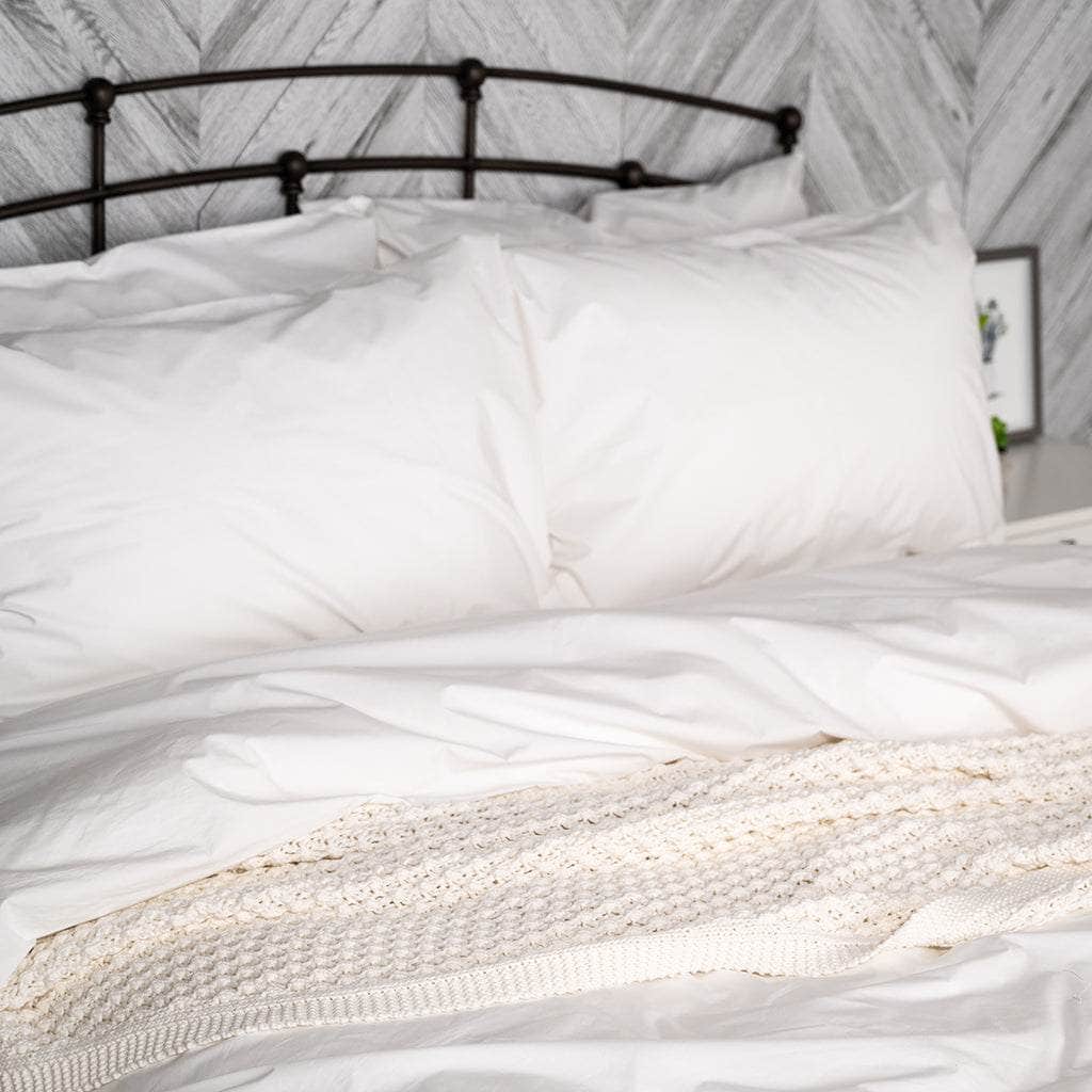Housse de couette et taies d'oreiller en percale de coton bio essentielle