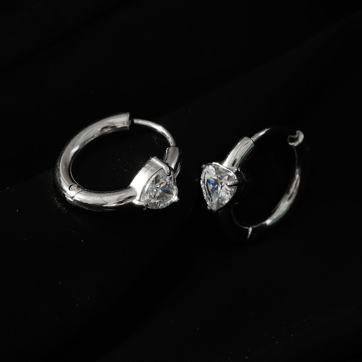 PELLA White Gold (Silver Toned): Mini Hoop Earrings with Heart Shaped Moissanite