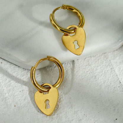 PYAR Gold: Mini Hoop Earrings Anchoring a Heart Shaped Keylock Charm