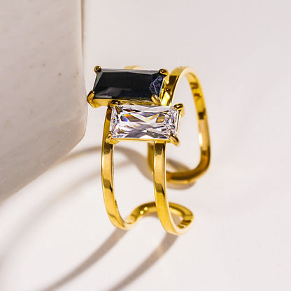 RIADEL : Bague ruban en zircone noire et transparente double éclat