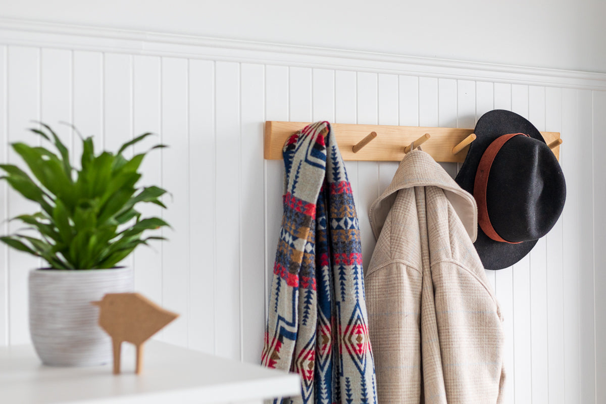 Wall-mounted coat rack