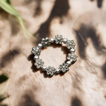 Bague fleur élastiquée en plaqué argent