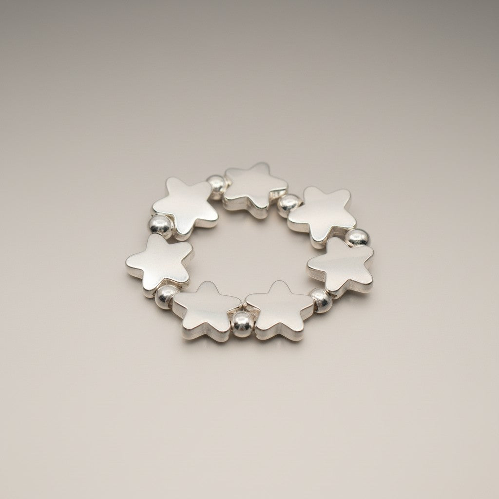 Elasticated Star Ring In Silver Plate