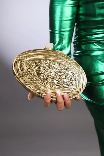 Pochette rigide dorée